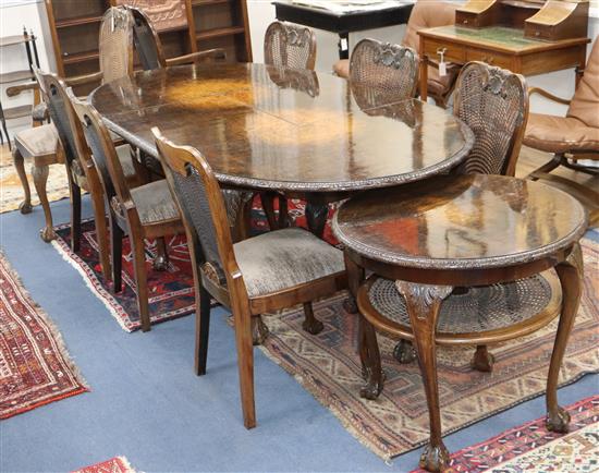 A 1930s walnut dining suite - table, eight chairs and a side table Table L.224cm